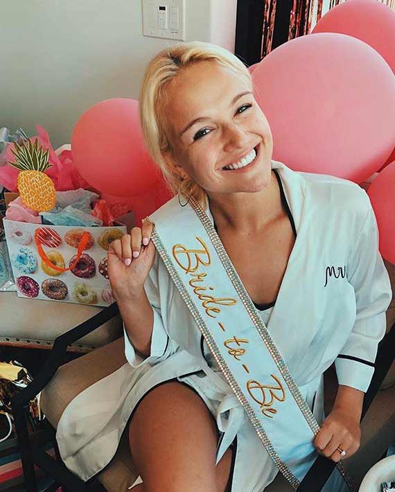 Woman with bride-to-be sash